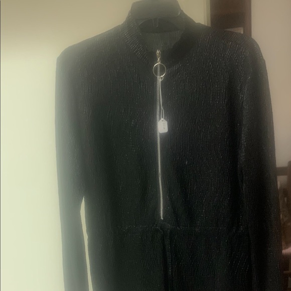 Black woman jumpsuit never worn. Thin material but not see through. Long sleeve - Picture 2 of 2